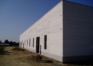 Finished building envelope made from light-weight concrete panels