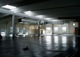 Laying of horizontal waterproofing material for the floor in the hall