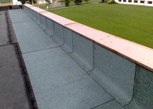 Attic detail (metal plating and placement of first layer of modified asphalt membranes)