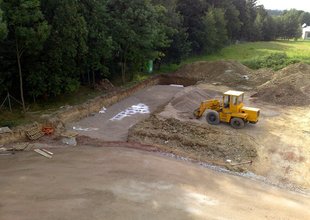 Underground soakage pit for draining rainwater from the roof and paved areas