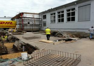 Excavation pits and preparing formwork for footing