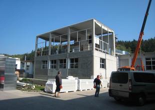 Overall view of the extension - ongoing work on putting the relocated air-conditioning unit into operation