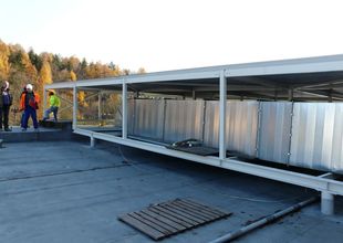 View of new HVAC ducts on the roof of the existing hall