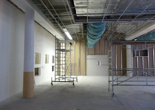 Grid for a new mineral ceiling in the existing hall