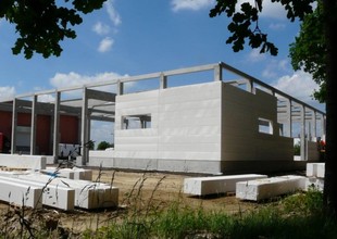 Installation of building envelope made from light-weight concrete panels