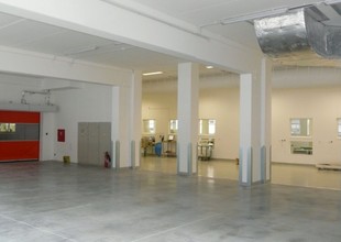 Interior of the 1st floor of the extension with a view into the existing hall